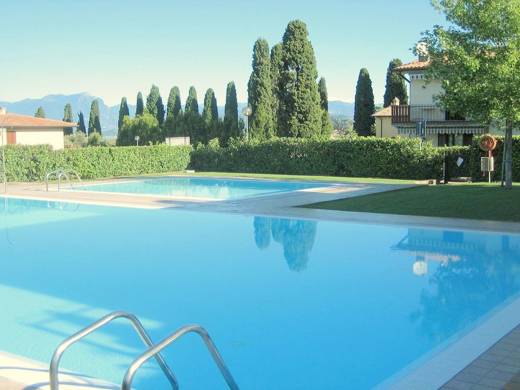 Belvilla By Oyo Enticing Holiday Home With Pool Lazise Exterior photo