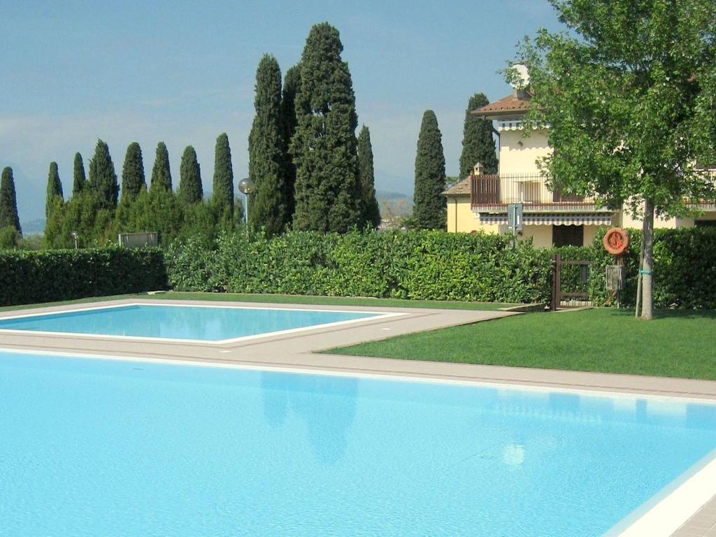 Belvilla By Oyo Enticing Holiday Home With Pool Lazise Exterior photo